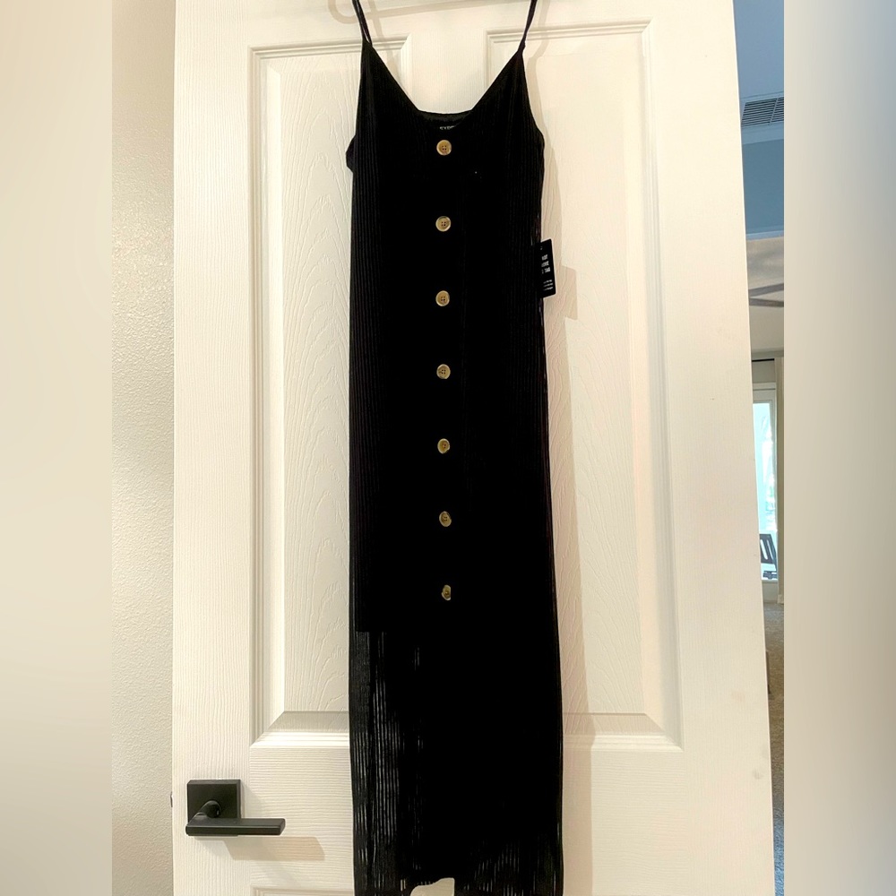 Express dress with front slit. Never worn with tags. Size medium.